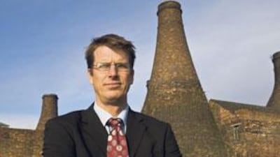 Tom Wedgwood, a direct descendant of the Wedgwood company founder, Josiah, stands in front of historic kilns in Stoke-on-Trent.