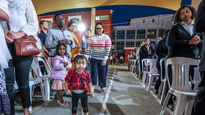 Worshippers of all ages attend Christmas Eve Mass at St Joseph's Cathedral in Abu Dhabi. Victor Besa / The National