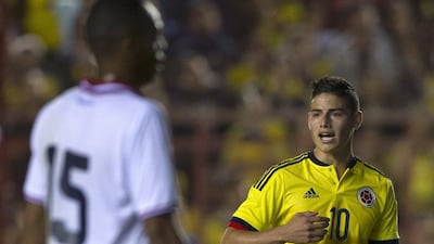 Colombia midfielder James Rodriguez, right, gestures during a friendly football match against Costa Rica at Diego Armando Maradona stadium in Buenos Aires, Argentina on June 6, 2015. AFP PHOTO / Alejandro PAGNI