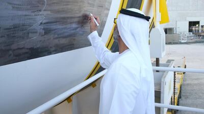 Sheikh Hamdan signed the base of the reactor vessel before it was lifted inside the Unit 2 reactor containment building.