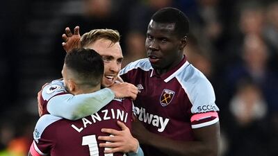 Kurt Zouma celebrates with Jarrod Bowen and Manuel Lanzini after Bowen scored for West Ham against Watford. Reuters