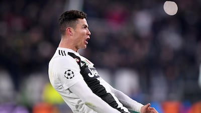 Juventus' Cristiano Ronaldo celebrates after scoring a penalty to make it 3-0 on the night and send the Italian side through to the Champions League quarter-finals 3-2 on aggregate. AFP