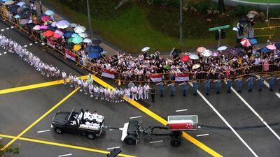 The state funeral procession of Lee seen from Swissotel The Stamford in Singapore, 29 March 2015. Jamie Koh, The Straits Times/EPA