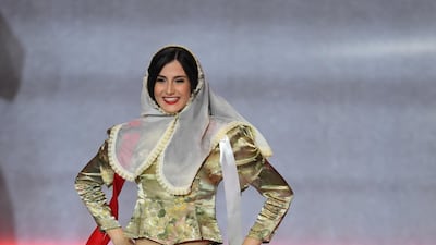Miss Malta Nicole Vella performs during the Miss World 2019 final in the ExCel centre in London. EPA