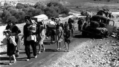 On the road: Palestinian refugees leave the Galilee en route to Lebanon in 1948. Benny Morris conclusively demonstrated in a 1988 book that the refugees had fled or been expelled by Israeli forces.