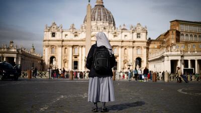 A nun in St Peter’s Square, the Vatican, after Pope Francis was taken to hospital for treatment for a respiratory infection. Reuters