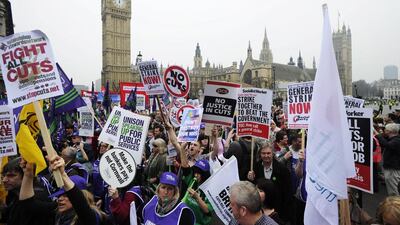 Protestors walk by Big Ben during a demonstration called "March for the Alternative" in London. Activists can sometimes find themselves conflicted over their motives. (EPA/FACUNDO ARRIZABALAGA)