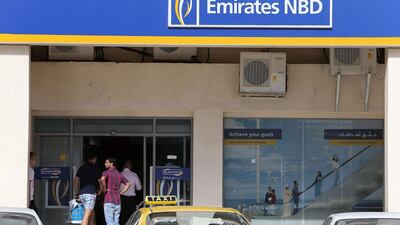 Emirates NBD’s impaired loan ratio dropped last year to 7.8 per cent from 13.9 per cent in 2013 after reclassifying Dubai World debt exposure as performing. Pawan Singh / The National