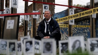 Mario Aguilera, who was held captive and tortured by the Pinochet regime in Chile, stands at the site of his detention in Santiago on the 50th anniversary of the coup d'etat that brought Pinochet to power on Friday. Reuters