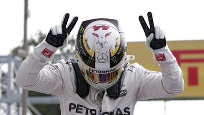 Mercedes' Lewis Hamilton celebrates qualifying in pole position on Saturday. Max Rossi / Reuters / September 3, 2016