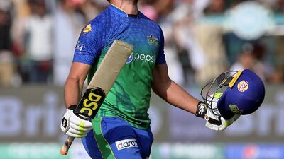 Multan Sultans' Rilee Rossouw reacts after completing his century against Quetta Gladiators during their Pakistan Super League match in Multan on Saturday. AP