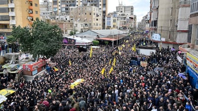 Hezbollah members and relatives carry the coffins of five Hezbollah fighters who were killed in Idlib, Syria, during a funeral procession in the southern suburb of Beirut, Lebanon. EPA