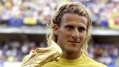 Forlan receives the Golden Boot award before Villarreal’s La Liga match against Sevilla on 11 September 2005. Forlan shared the honours with Arsenal’s Thierry Henry with 25 goals apiece. Jose Jordan / AFP