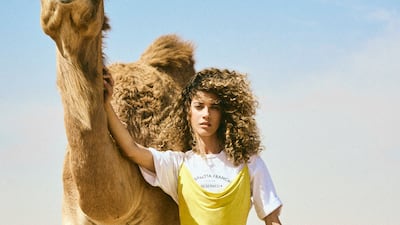 T-shirt, Dh680; and dress, Dh3,960, both from Elisabetta Franchi. Shoes, Dh3,090, Gianvito Rossi. Cabin suitcase, Dh12,688, Gucci