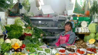 Xia Fengke at her stall in Beijing's San Yuan Li Market. Hannah Gardner for The National