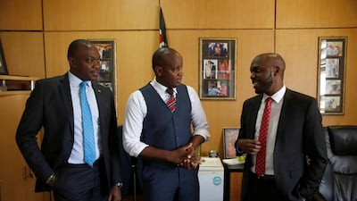 Nation media group manager for television Linus Kaikai, senior news reporter Ken Mijungu and news anchor Larry Madowo. REUTERS/Baz Ratner