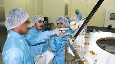 Engineers for the Emirates Institution for Advanced Science & Technology complete the design of DubaiSat-2 in Daejeon, South Korea.