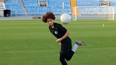 Players of the first Saudi Women's National Football Team, managed by veteran German Monika Staab, attend a training and show off their skills at Prince Faisal bin Fahad bin Abdulaziz stadium in Riyadh. Saudi Arabia's launch of its first women's football league on November 22 will open the door for hundreds of girls hoping to begin their professional careers - and maybe one day take part in the Women's World Cup. The wealthy Gulf country, which lifted a ban on women's football only a few years ago, wants to strengthen its women's national team in the hopes of taking part in international tournaments. All photos: AFP