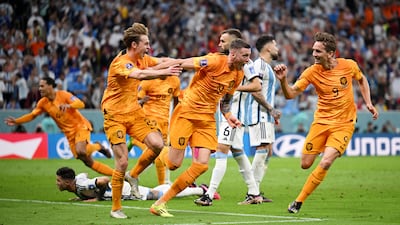 Netherlands substitute Wout Weghorst celebrates after making it 2-2. Getty