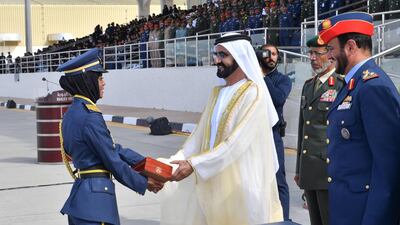 Sheikh Mohammed presents the top cadet officer graduates, including graduates from Kuwait, Qatar and Kingdom of Bahrain, with appreciation awards. Wam
