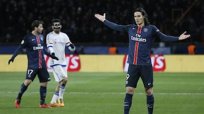 PSG's Edinson Cavani, right, reacts during the UEFA Champions League Round of 16 first leg match between Paris Saint-Germain and Chelsea FC at the Parc des Princes Stadium in Paris, France, 16 February 2016. EPA/ETIENNE LAURENT