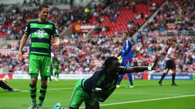 Bafetimbi Gomis celebrates scoring for Swansea City against Sunderland in trademark style by getting on his hands and knees and clawing like a cat. As you do. The routine is apparently a tribute to former Saint-Etienne player Salif Keita, whose nickname was "The Black Panther". Getty