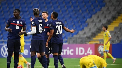 France players celebrate after Sergey Maliy's own-goal for Kazakhstan. AFP