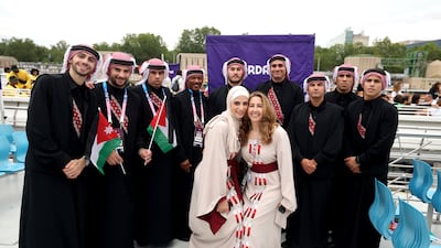 Athletes from Jordan pose for a photo. AP