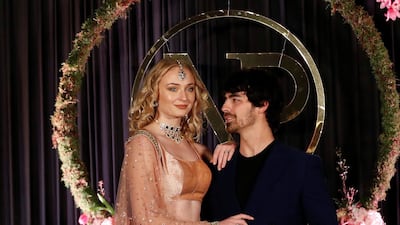 Sophie Turner and Joe Jonas pose during a photo opportunity at the wedding reception of Bollywood actor Priyanka Chopra and singer Nick Jonas, in New Delhi. Photo: Reuters