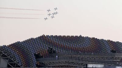 Al Fursan aerobatic display team perform fly over South Korea Pavilion in the late afternoon at Dubai Expo. Khushnum Bhandari/ The National