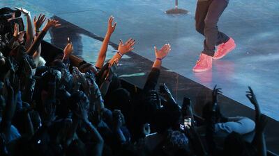 Singer Kendrick Lamar sings at a break during the skills competition at the NBA All Star basketball game. Bill Haber / AP photo