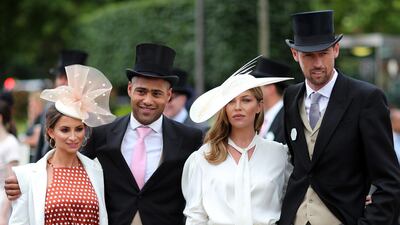 Laura Johnson, Glen Johnson, Abbey Clancy and Peter Crouch during ladies day. Reuters