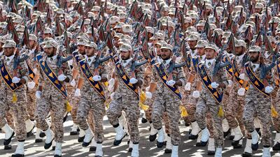 Members of Iran's Revolutionary Guard Corps march during a parade in Tehran. AFP