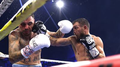 Lomachenko backs up Kambosos. EPA