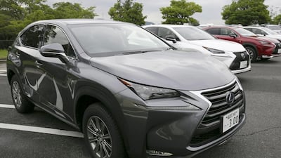 Toyota’s new sport utility vehicle Lexus NX 200t and 300h on display at the company's assembly plant in Miyawaka. Kimimasa Mayama / EPA