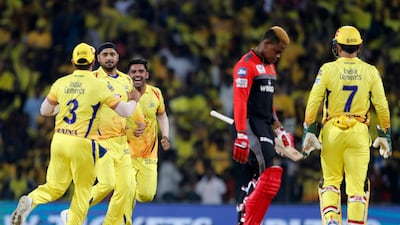 Chennai Super Kings players celebrate the dismissal of Royal Challengers Bangalore's Shimron Hetmyer, second right, during the VIVO IPL T20 cricket match between Chennai Super Kings and Royal Challengers Bangalore in Chennai, India. AP Photo