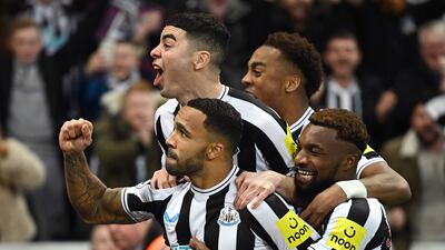 Callum Wilson celebrates with teammates after scoring. AFP