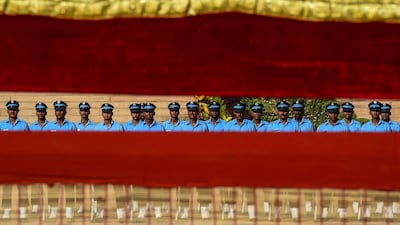 Soldiers from the Indian army stand at attention during a ceremonial reception for visiting Uzbekistan's President Shavkat Mirziyoyev at the presidential palace in New Delhi. Chandan Khanna/AFP