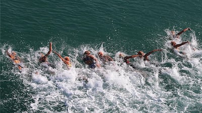 Women start swimming in Elite Men’s 2016 ITU World Triathlon yesterday on Abu Dhabi Sailing and Yacht Club on Breakwaters. Ravindranath K / The National