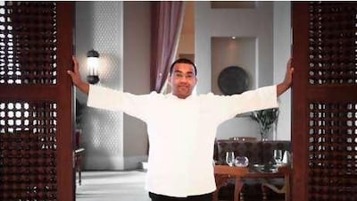 Ali Salem Ebdowa stands in the doorway which leads into one of the dining areas of his new restaurant, Mezlai, which is located on the bottom floor of the Emirates Palace.