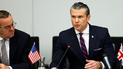 US Defence Secretary Pete Hegseth, right, at a meeting about Ukraine in Brussels on Wednesday. AP