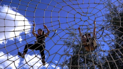 Aventura guests on the spider web on the extreme circuit area at Adventura Parks in Dubai. Victor Besa / The National