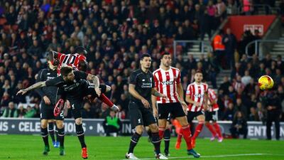 Soutahmpton’s Sadio Mane heads in a first-minute strike to put his team 1-0 up against Liverpool on Wednesday night in the League Cup. Clive Rose / Getty Images