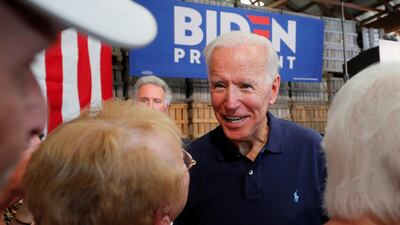 Democratic 2020 US presidential candidate and former US Vice President Joe Biden greets audience members during a campaign stop at Mack's Apples in Londonderry, New Hampshire, US, July 13, 2019. Reuters