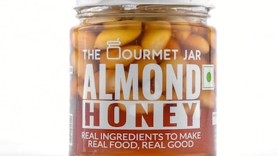Blanched almonds steeped in organic honey sourced from farms in North India, by The Gourmet Jar and available at Hayawiia