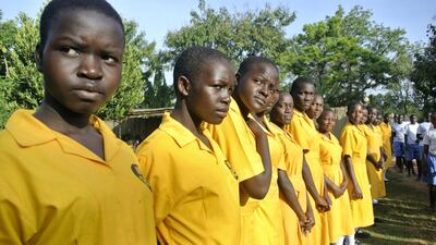 Pupils from St Katherine Secondary School wait to welcome officials from Dubai Cares. Roberta Pennington / The National