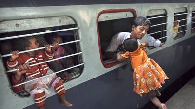 India’s railway minister Mallikarjun Kharge also promised that passenger service to religious tourist destinations, such as Vaishno Debi and Katra, will be launched shortly. Kevin Frayer / AP Photo