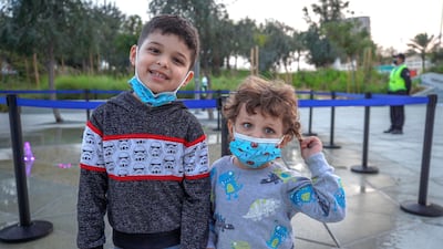 Ahmed Rawashdeh, 4, and his brother Kareem, 2, at the fountain area in Al Fay Park on Reem Island