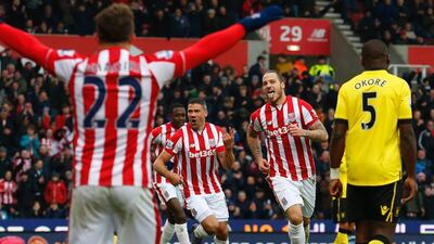 Stoke City's Austrian striker Marko Arnautovic, second from right, celebrates after scoring his second goal during the English Premier League match between Stoke City and Aston Villa at the Britannia Stadium in Stoke-on-Trent, central England on February 27, 2016. AFP / LINDSEY PARNABY