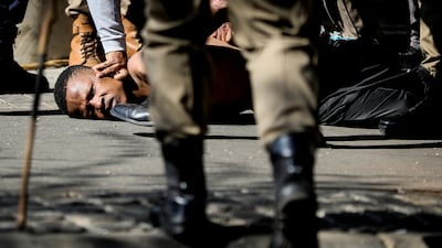 Another man is arrested as officers attempt to purge the violence on the streets..